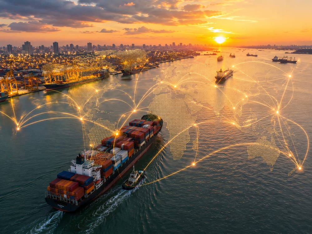 A container ship in transit with global shipping routes